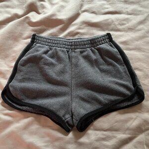 Brandy Melville gray dolphin shorts with black trim